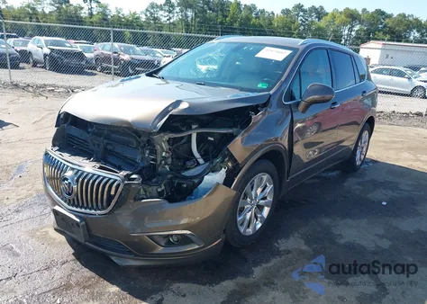 2018 Buick Envision Essence z USA, uszkodzony, nr VIN LRBFX1SA3JD027381